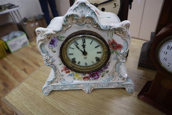 Four assorted wood and ceramic mantel clocks tallest 38cm